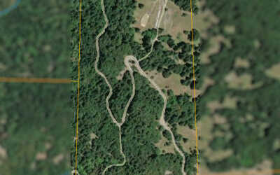 Timber Acreage with Cabins and Country Roads